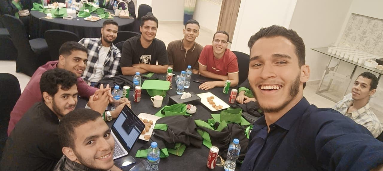 Yosef Beder eating dinner with the other top national students