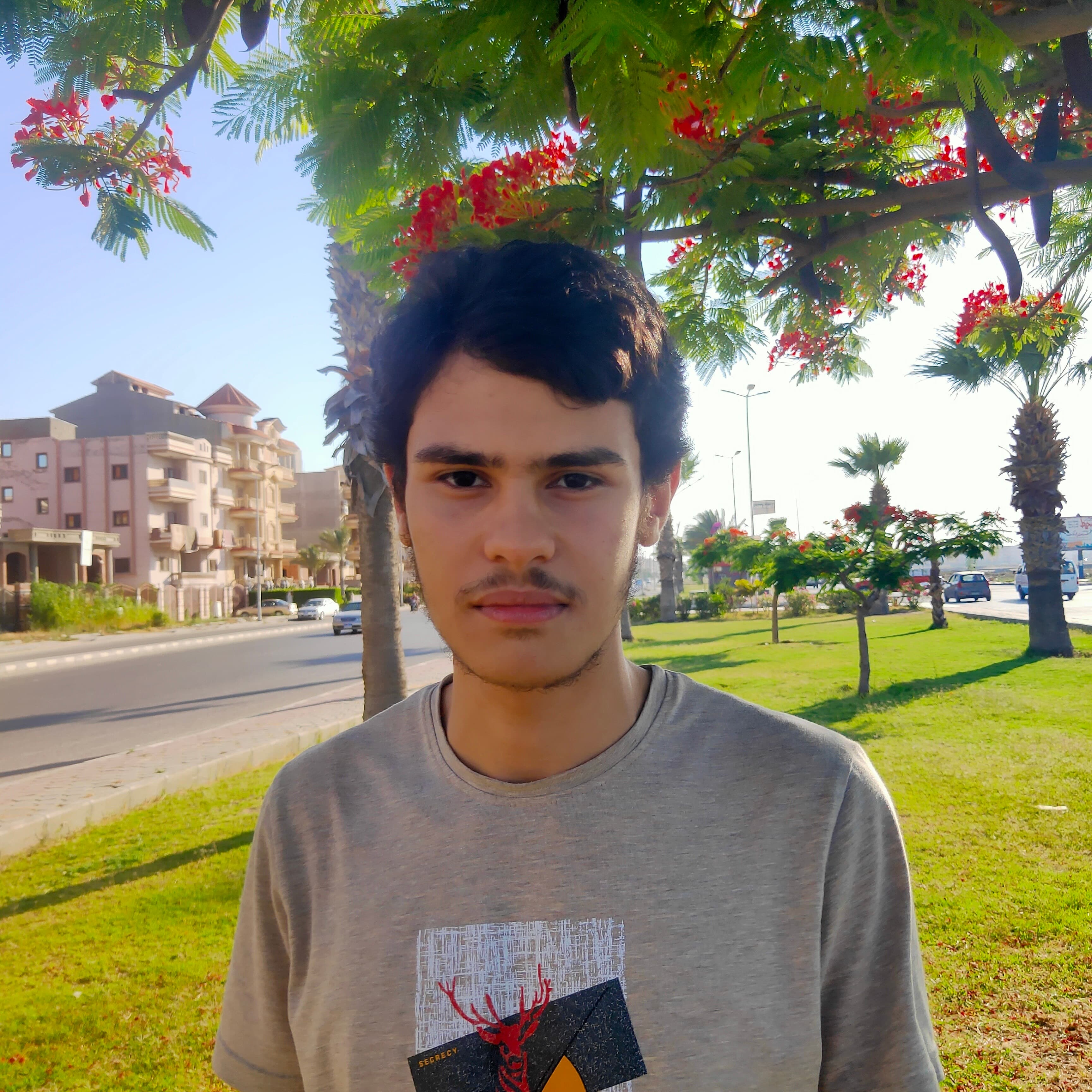 Yosef Beder standing outdoors in a casual setting