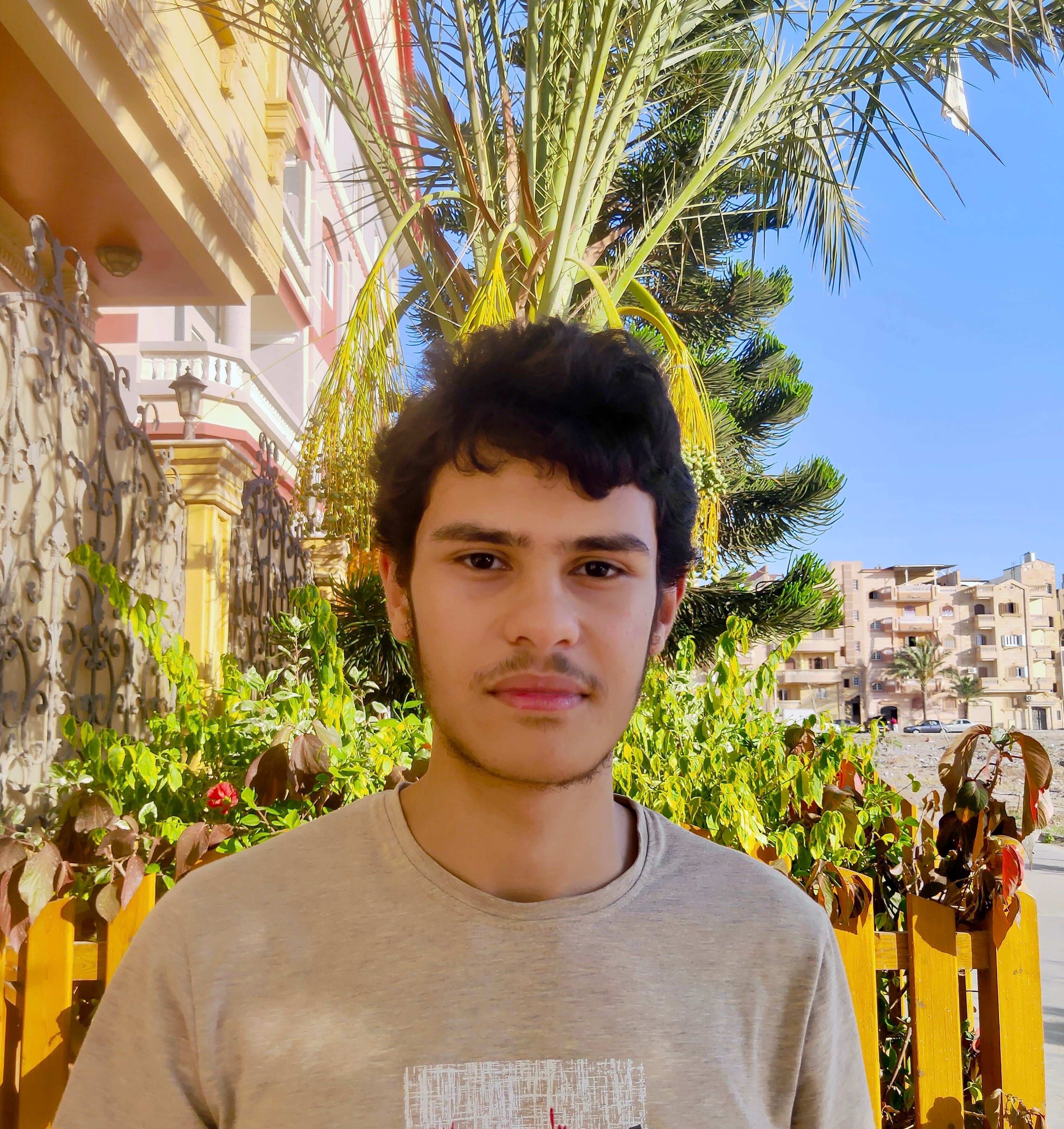 Casual photo of Yosef Beder smiling outdoors